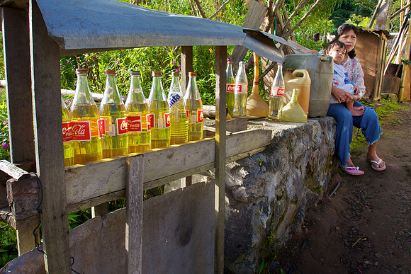 Indonesian Mini Gas Station - Coca-Cola Bottles Filled with Gasoline